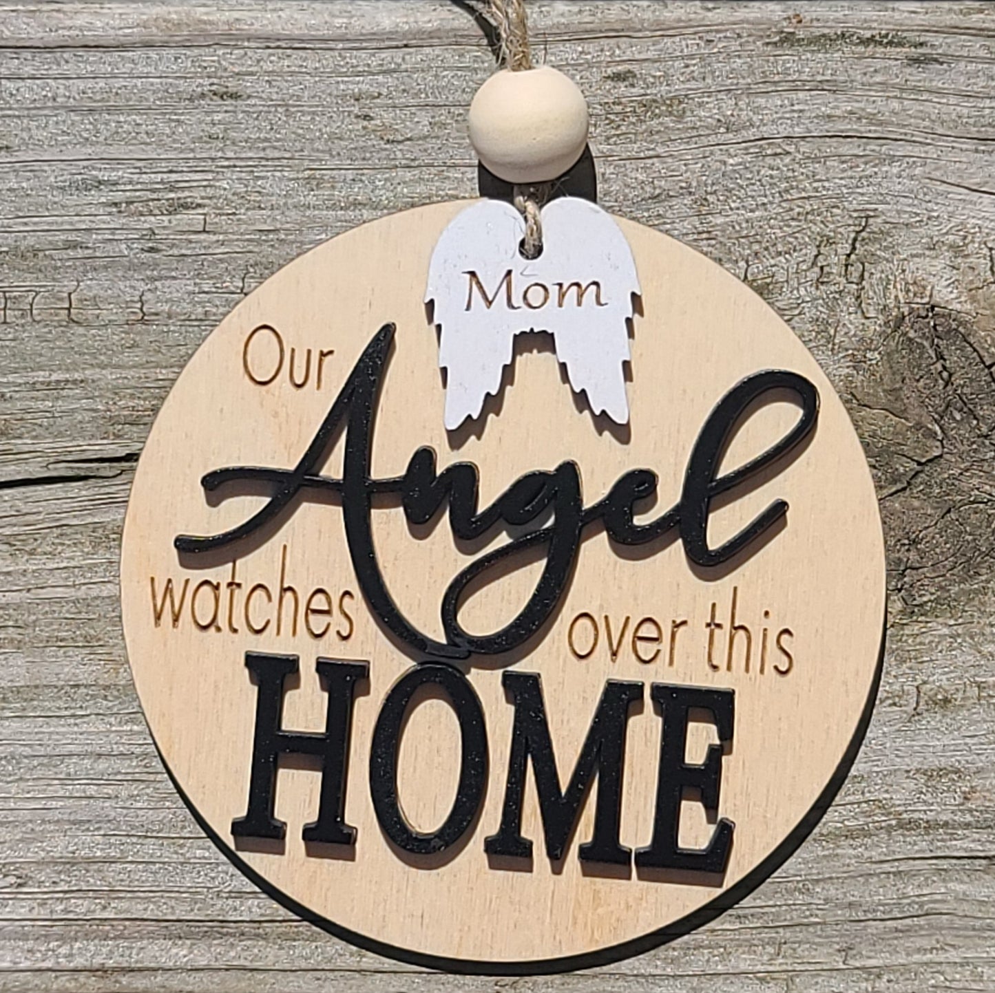 Our Angel watches over this home ornament